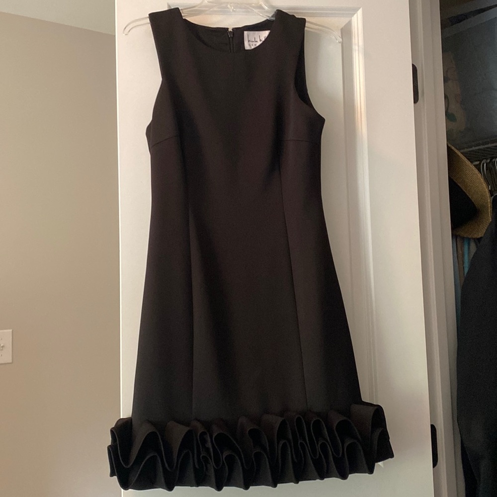 Black mini dress with ruffle hem